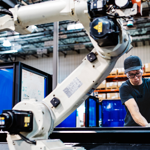 Smart Manufacturing Man with Robot